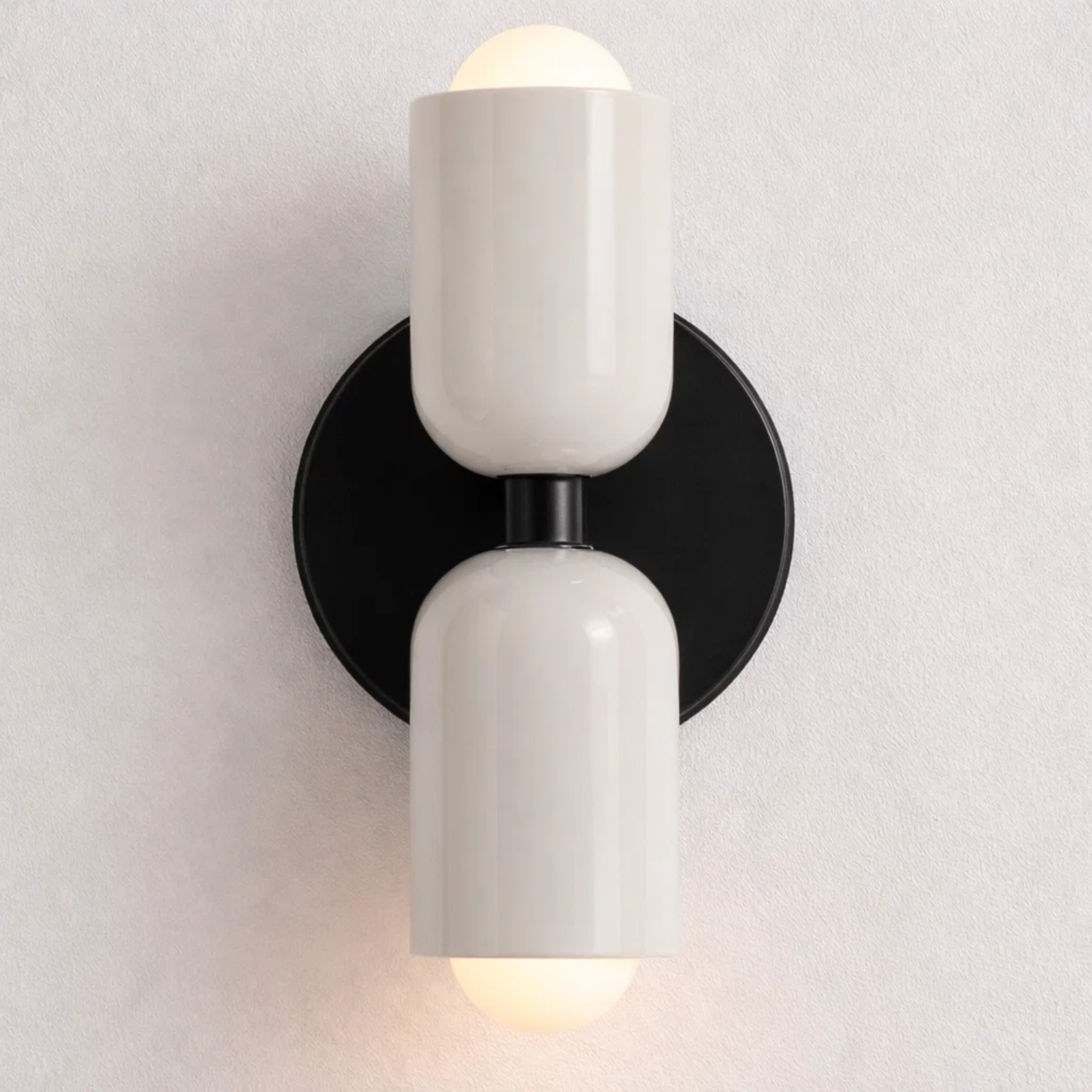 Dubbele wandlamp met warm licht