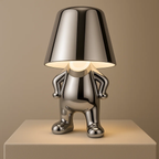 Moderne oplaadbare tafellamp met decoratief figuur