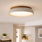 Rund loftlampe i travertin i wabi-sabi stil