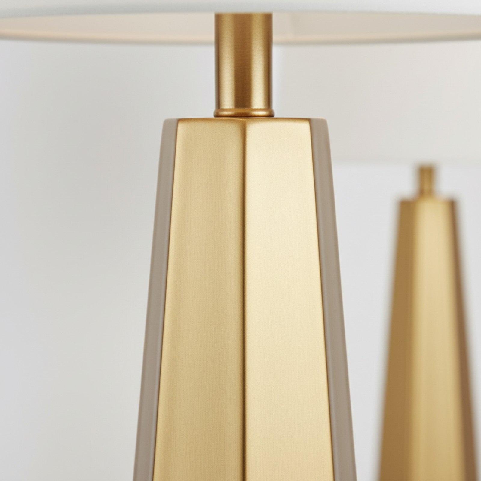 Anechdoche Table Lamp detail close-up of gold geometric base