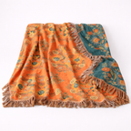 Vendbar dekorationsplaid med morgenfruemotiv